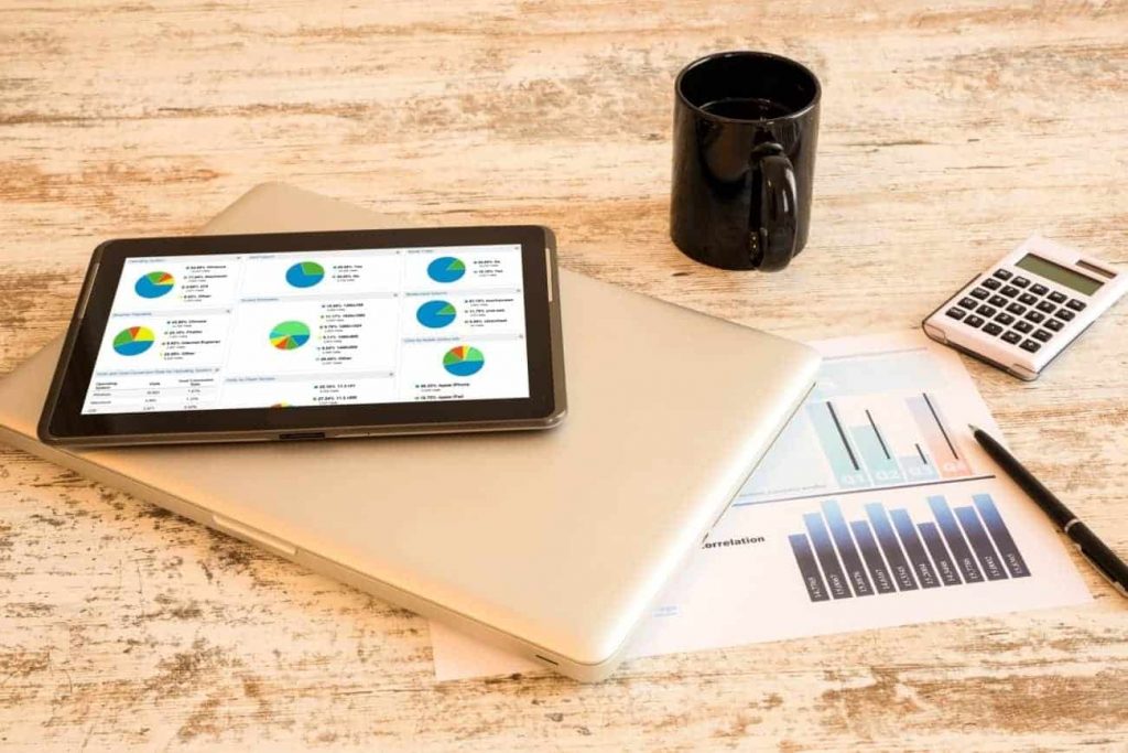 google-analytics-social-media-marketing -on-wooden-desk