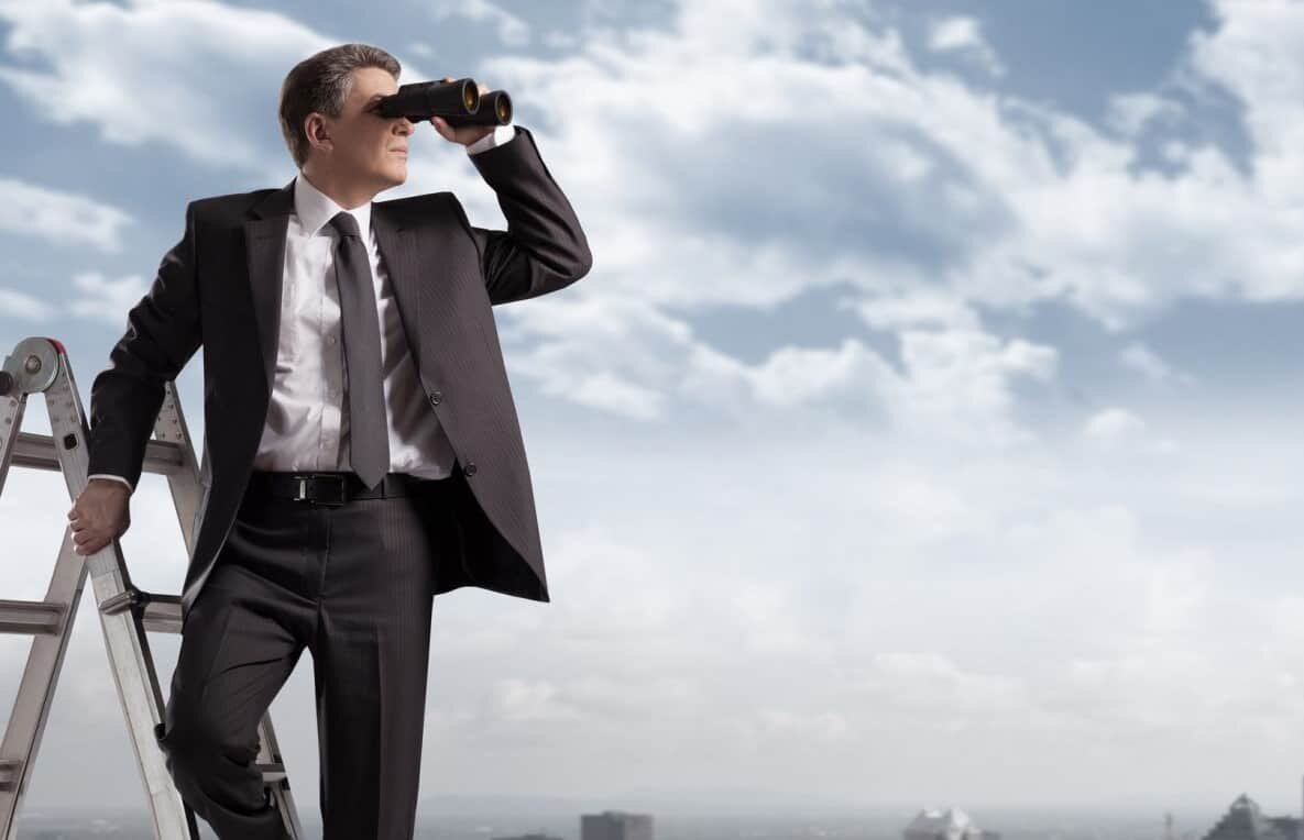 Businessman with binoculars